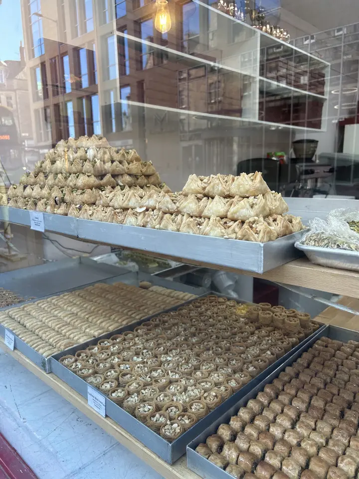 Pyramids of baklava stacked in the shop window